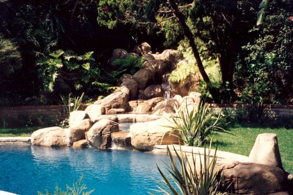 pool-with-relaxing-waterfall-1_riviera-pools-and-spas_premium-pool-builder-in-los-angeles-and-southern-california