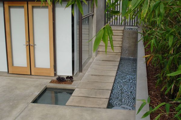 unique-water-feature-with-path_riviera-pools-and-spas_premium-pool-builder-in-los-angeles-and-southern-california